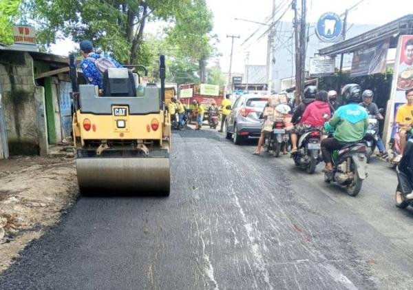 Pemkot Tangerang Aspal Jalan Menuju TPA Rawa Kucing